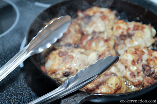 Make sure that you now have a clean set of tongs for handling the cooked chicken.