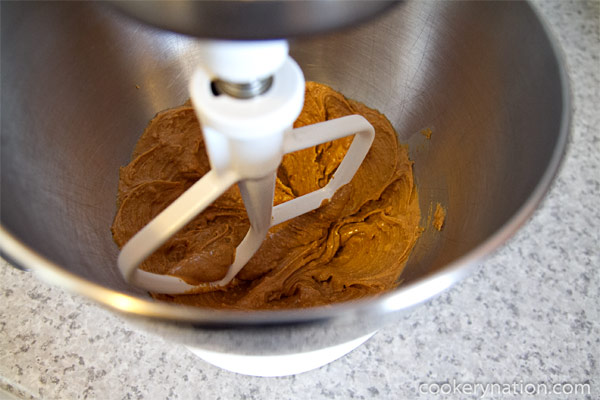 Place peanut butter in mixing bowl and give it a quick mix just to loosen it up.