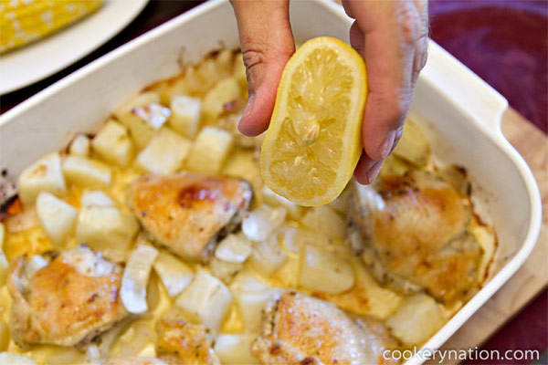 Remove from oven and squeeze lemon over the top of the entire dish.