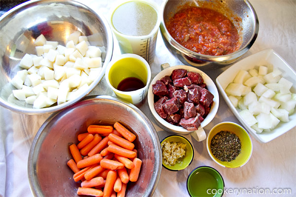 Gather your ingredients. Peel and dice the potatoes, onions and carrots into bite sized pieces.