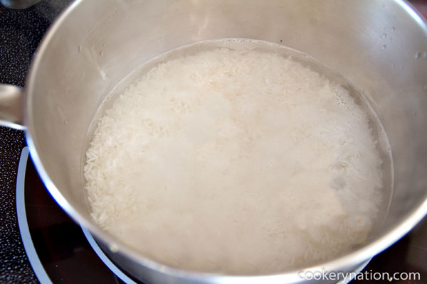 Heat the pot over high heat until it comes to a boil. Once it begins to boil, turn the heat to its lowest setting and cover the pot with a tight fitting lid. Set a timer for 15 minutes. Do not open the lid during the cooking process.