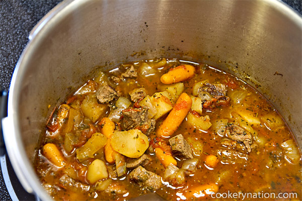 Once the pressure has released, open the lid and stir.